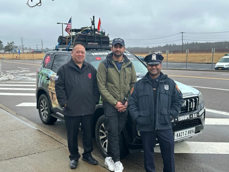World traveler on quest for guinness record visits suffolk county police - photo licensed by shore news network.
