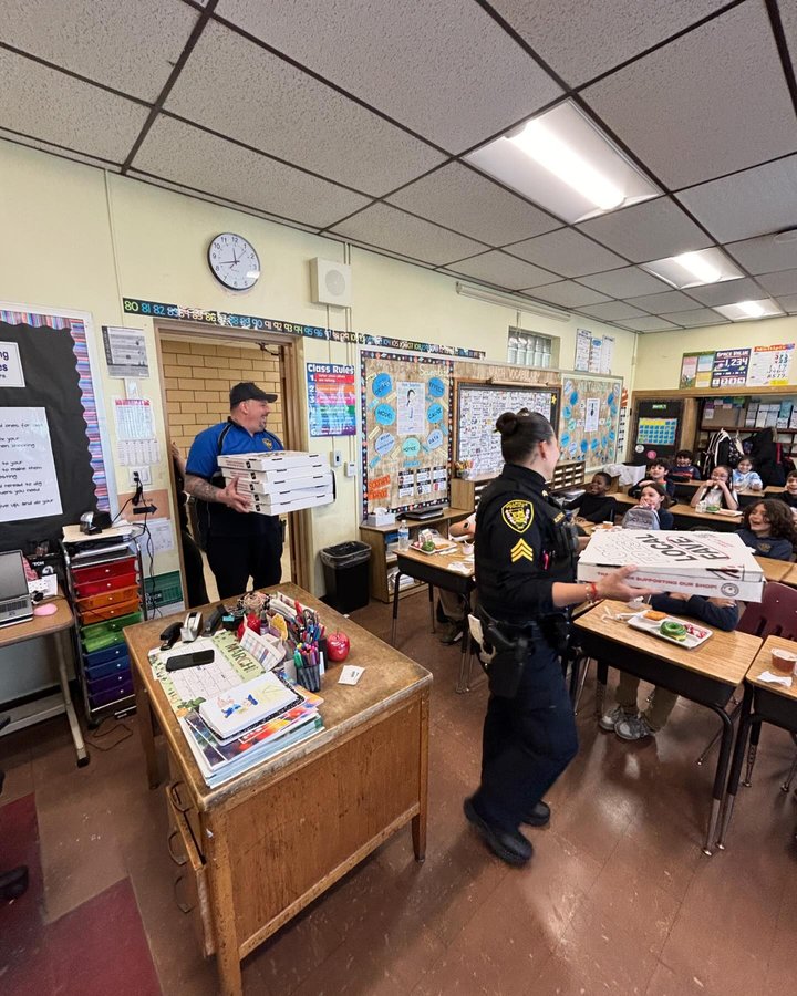 Belleville Police Officers Host Pizza Party for Reading Challenge with Local Students