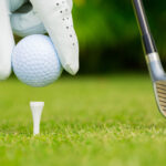 Golf ball on tee at Golf Course - File Photo
