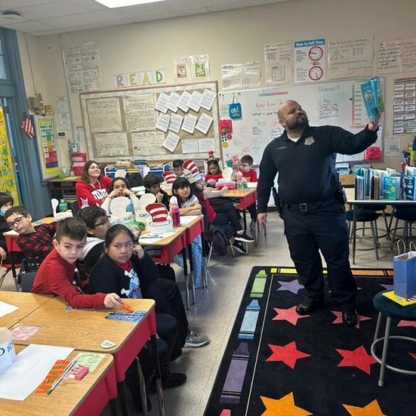 Newark officer join reading across america event at wilson avenue school - photo licensed by shore news network.