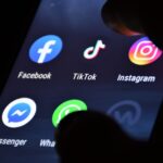 arious app, Facebook, Instagram, TikTok logo, app icon, logo displayed on a modern smartphone with various apps, banned, oracle