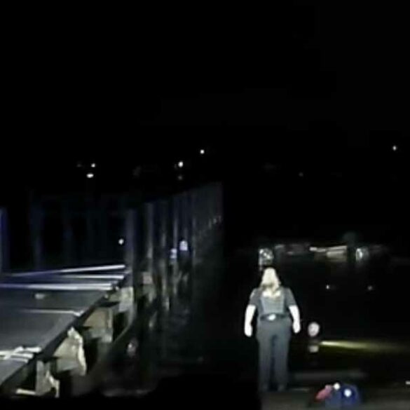 Man fleeing police drives off boat ramp rescued by cops - photo licensed by shore news network.