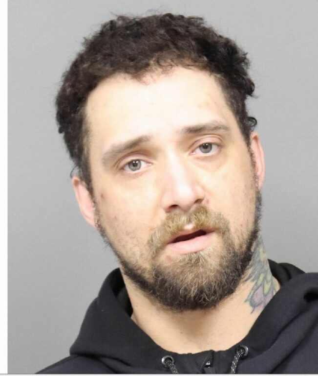 Highway Crew Finds Ankle Bracelet that Leads Police to Wanted Fugitive