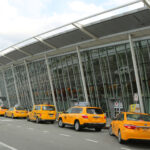NYC taxi at Delta Airline Terminal 4 at JFK International Airport in New York. JFK is one of the biggest airports in the world with 4 runways and 8 terminals