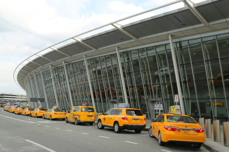 Nyc taxi at delta airline terminal 4 at jfk international airport in new york. Jfk is one of the biggest airports in the world with 4 runways and 8 terminals