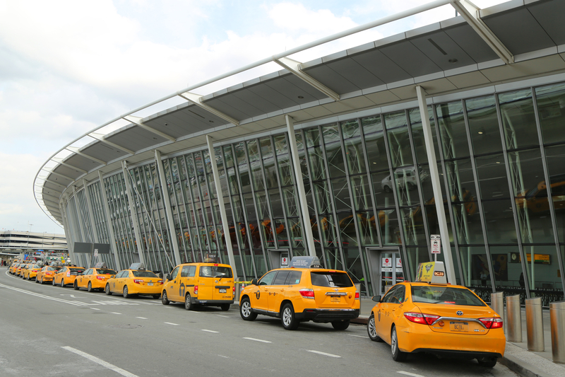 NYC taxi at Delta Airline Terminal 4 at JFK International Airport in New York. JFK is one of the biggest airports in the world with 4 runways and 8 terminals