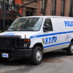 NYPD Ford E-Series Police Car in NYC. NYPD Ford E-Series Police Van in Manhattan, New York City, USA.