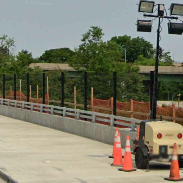 Man dangling from alexandria bridge rescued by police, fire department - photo licensed by shore news network.