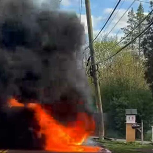 No injuries in reported clarkstown fiery car crash - photo licensed by shore news network.