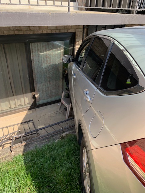 Vehicle Crashes into Alexandria Apartment Building; No Injuries Reported
