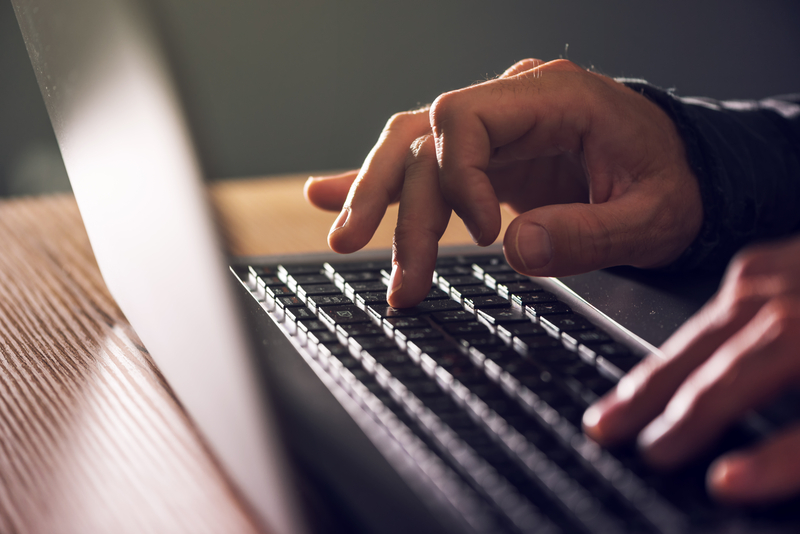 A man using a laptop
