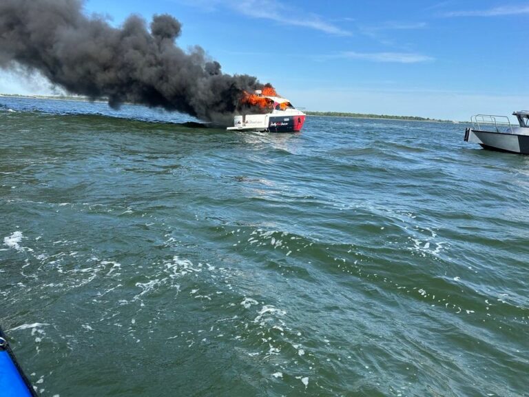 Suffolk county police rescue boaters from fire on great south bay - photo licensed by shore news network.