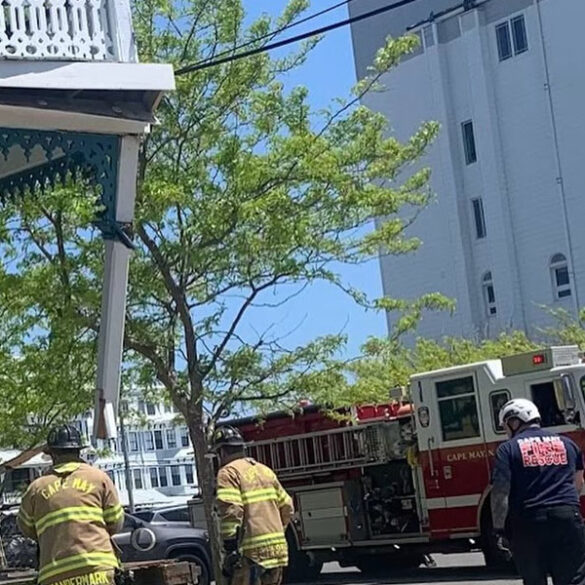 Cape may firefighters save victorian balcony from collapse after garbage truck drove into it - photo licensed by shore news network.