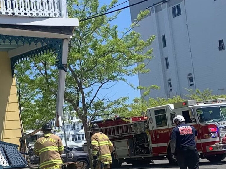 Cape may firefighters save victorian balcony from collapse after garbage truck drove into it - photo licensed by shore news network.