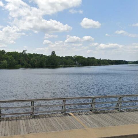 New million dollar pedestrian bridge enhances access to lake carasaljo in lakewood, nj - photo licensed by shore news network.