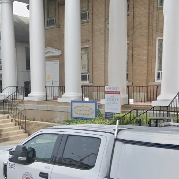 Why there so many cops at the old banner school? Here's what's happening - photo licensed by shore news network.