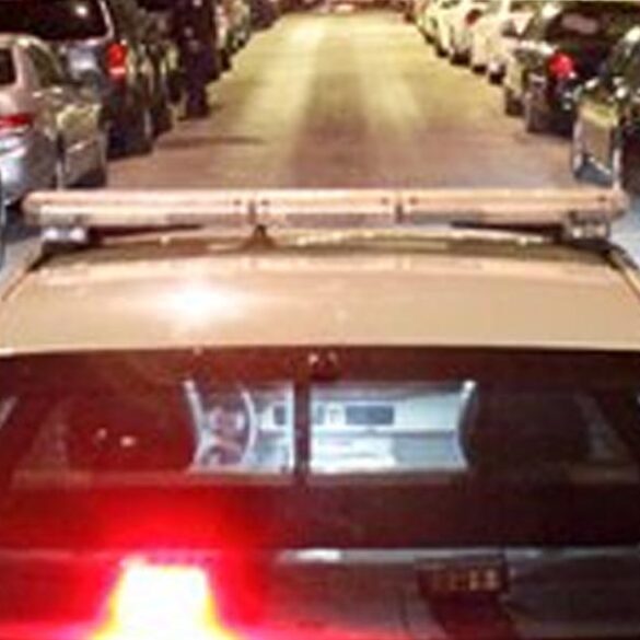 Philadelphia police car on a dimly lit street