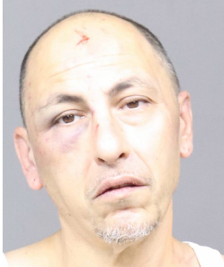 Fugitive Parolee Attacks Police Officers