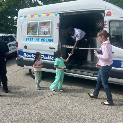 Boston police share sweet moments at local school ice cream social - photo licensed by shore news network.