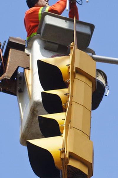 A traffic light being repaired. File Photo