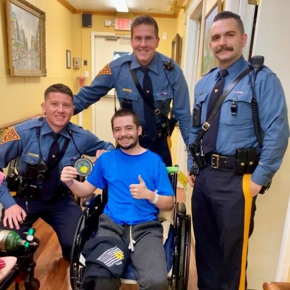 Terminally ill junior firefighter thanks state troopers for response - photo licensed by shore news network.