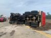 Overturned dump truck shuts down tinton avenue