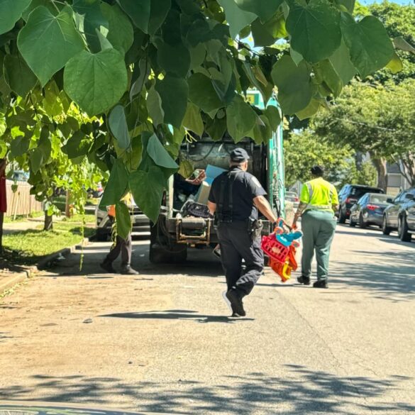 Baltimore police pitch in to cleanup nuisance intersection - photo licensed by shore news network.