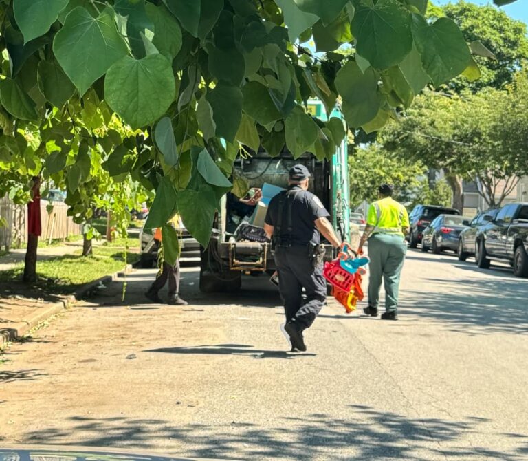 Baltimore police pitch in to cleanup nuisance intersection - photo licensed by shore news network.