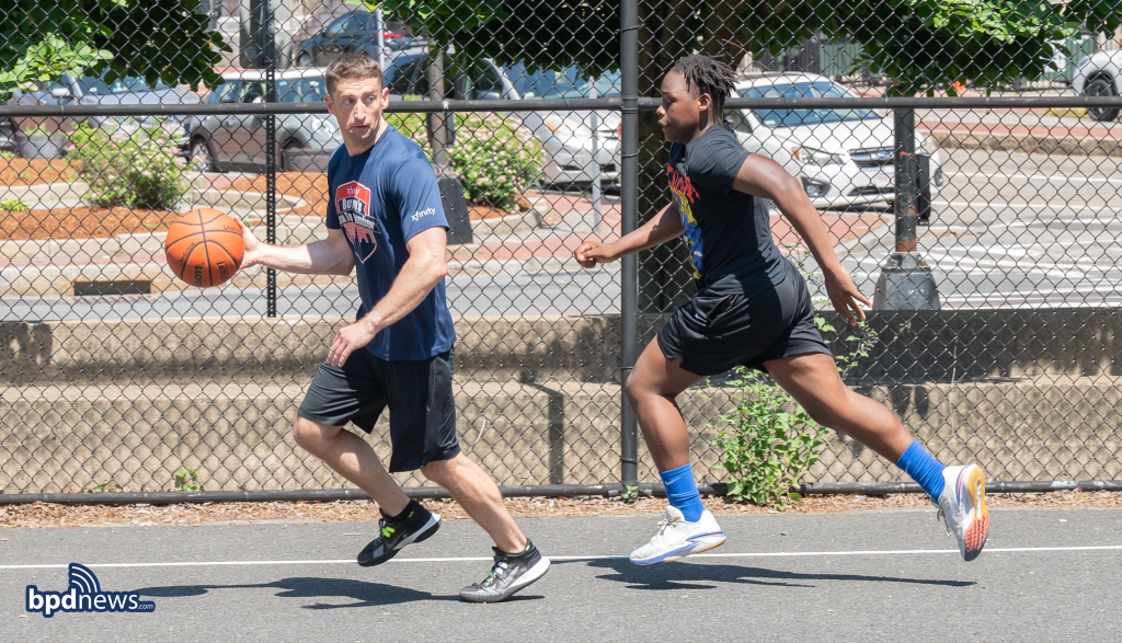 Boston Police District D-4 Engages in Friendly Basketball Game with Local Students