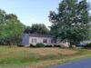 Fire officials investigating trash fire behind salisbury home