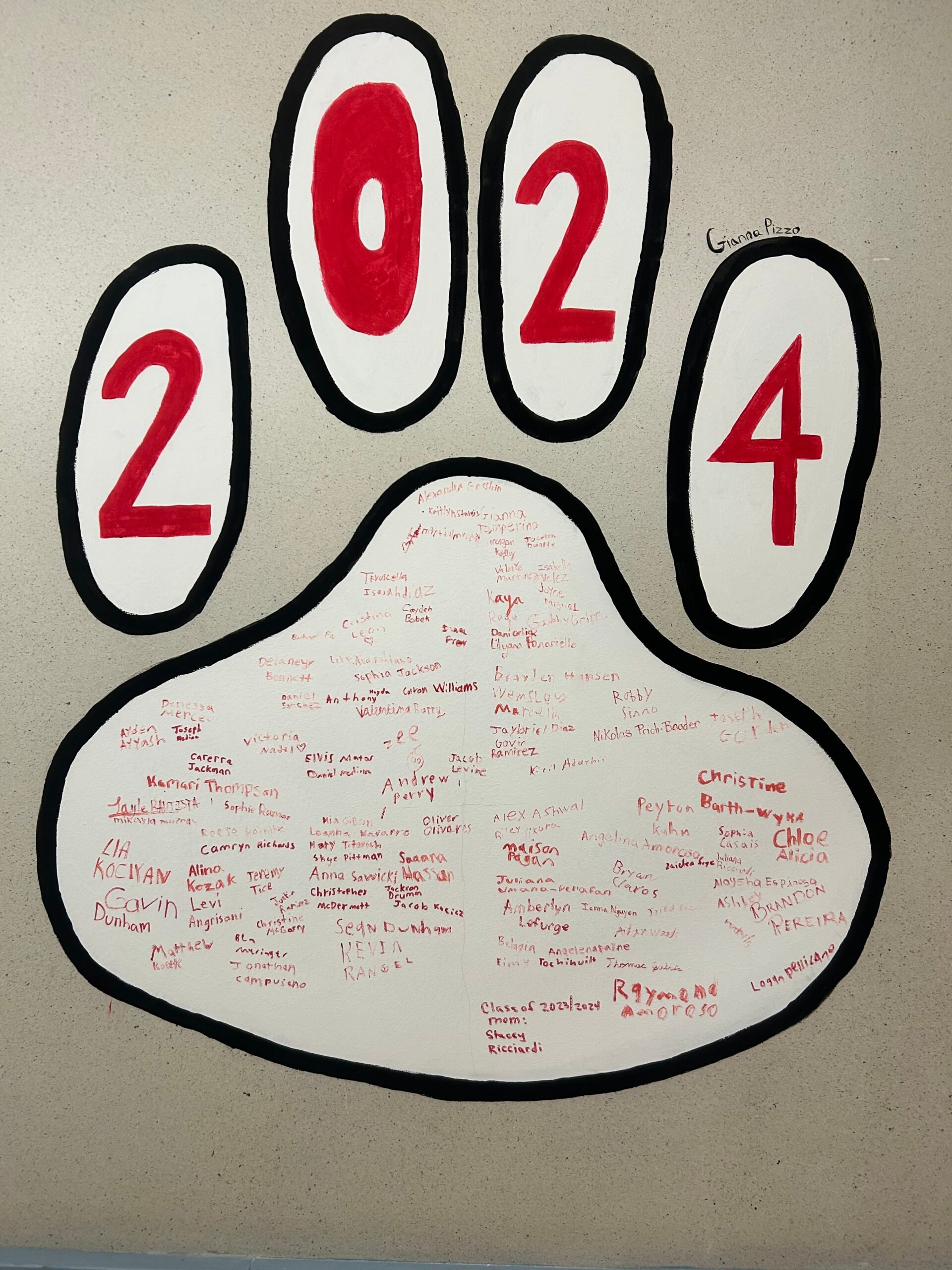 Crawford Rodriguez Kicks Off New Tradition with Paw Print Inspirational Banner