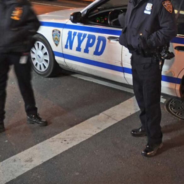 New york city police department officers arrive at crime scene.