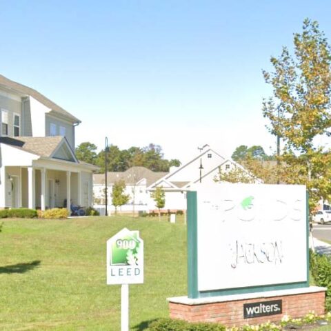 Fire at jackson twenty-one damages two units, police officers injured - photo licensed by shore news network.