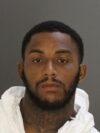 Woman critically injured in baltimore shooting, husband charged