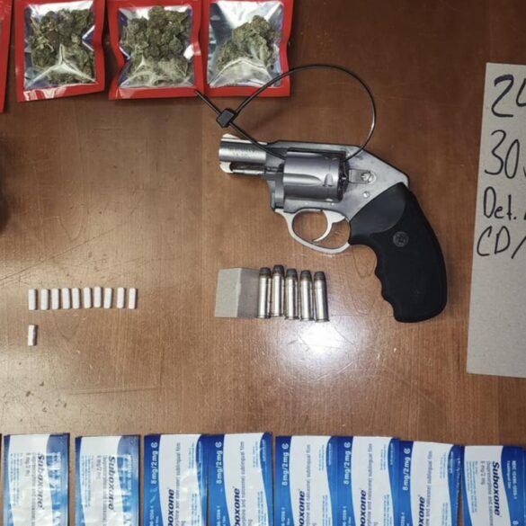 Baltimore police arrest suspect for handgun and cds possession - photo licensed by shore news network.