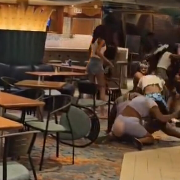 Brawl erupts at carnival cruise ship food court captured by man who just wanted some pizza - photo licensed by shore news network.