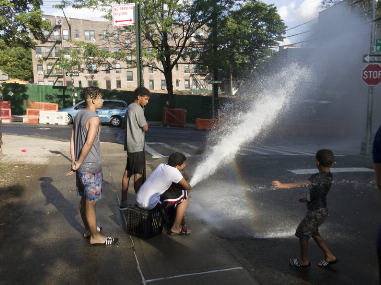Cool off at a fire hydrant in newark this week - photo licensed by shore news network.