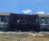 Fire guts toms river town homes, child among two injured.
