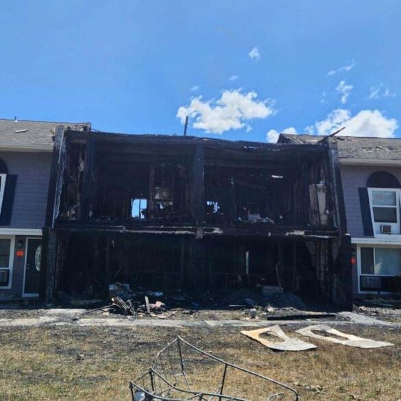 Fire guts toms river town homes, child among two injured. - photo licensed by shore news network.