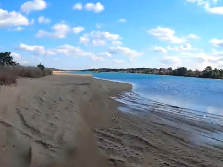 Notorious and deadly jersey shore flooded open pit mine claims another life - photo licensed by shore news network.