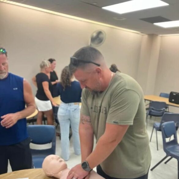 Wall township police and ems partner with youth football and cheer for cpr training - photo licensed by shore news network.