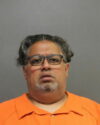 Former bank employee charged with stealing nearly $1 million from customer