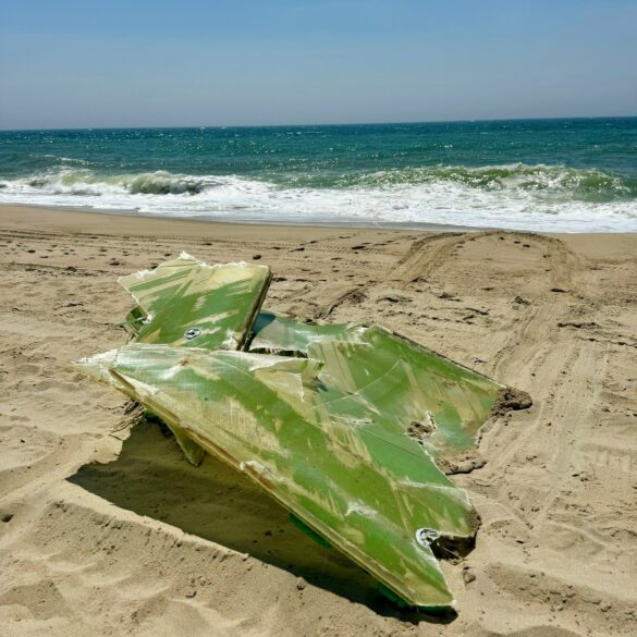 Sharp, jagged debris washes ashore on nantucket beaches officials say "wear shoes" - photo licensed by shore news network.