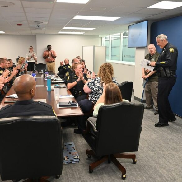 Virginia beach police department honors long-serving volunteers - photo licensed by shore news network.