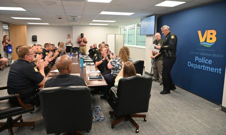 Virginia beach police department honors long-serving volunteers - photo licensed by shore news network.