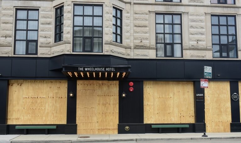 Chicago businesses are boarding up ahead of planned violence, turmoil outside dnc convention - photo licensed by shore news network.