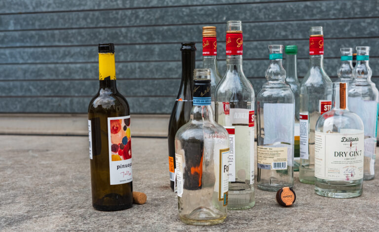 Drunk driver had stash of empty liquor bottles in car - photo licensed by shore news network.