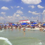 Ocean City beach, New Jersey, USA. People enjoy the beach along the coastline in Ocean City, New Jersey, USA