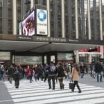 Passengers outside Penn Station New York. Penn Station at Madison Garden Square Manhattan New York