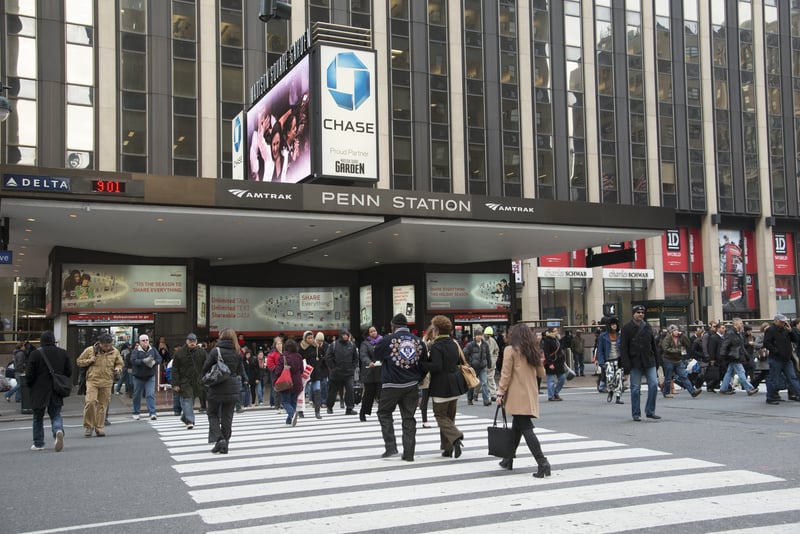 Passengers outside Penn Station New York. Penn Station at Madison Garden Square Manhattan New York